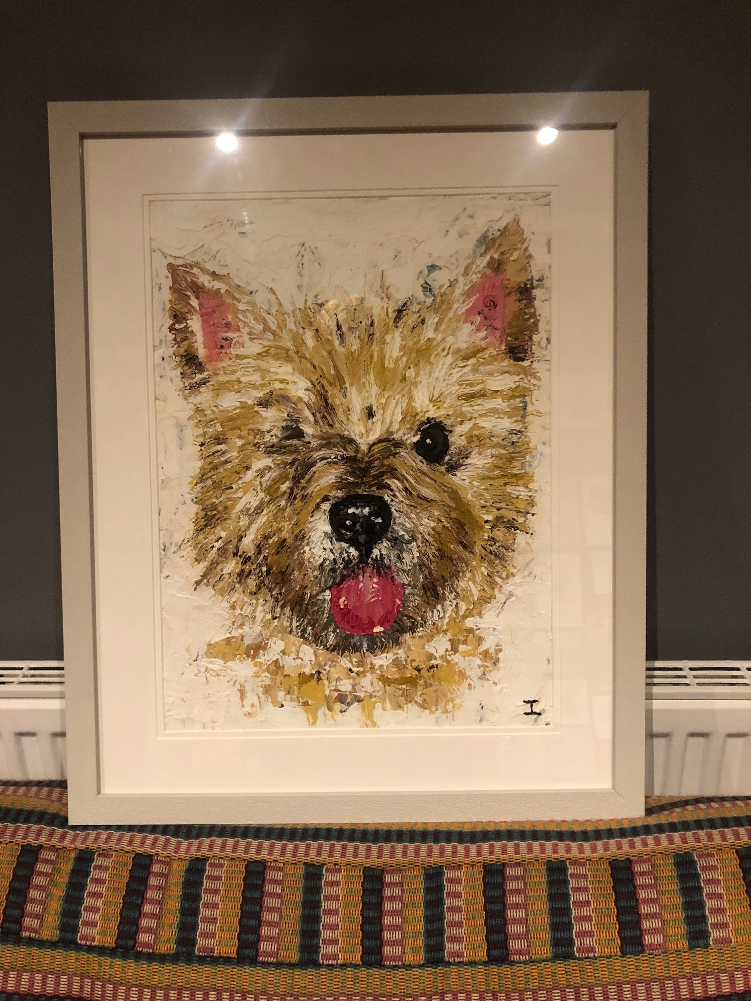 Framed painting of the family dog, through palette knife painting